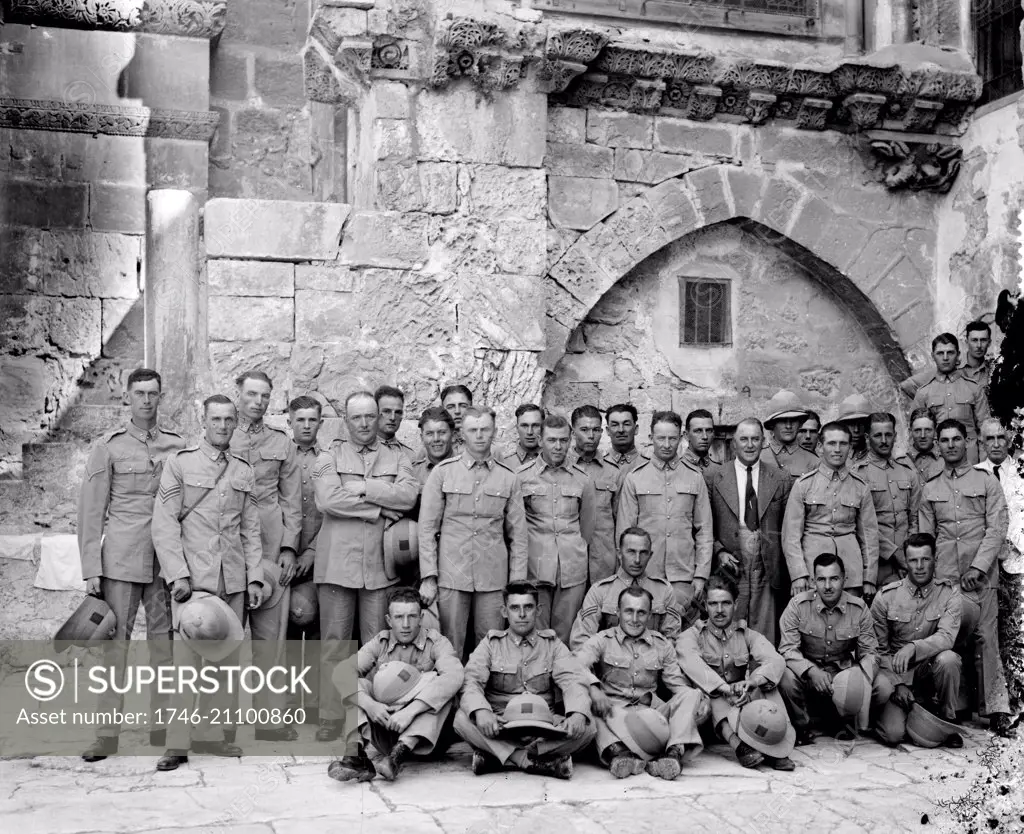 Photograph of a British Military group in Jerusalem in the courtyard of the Holy Sepulchre Church during the mandate of Palestine. Dated 1920