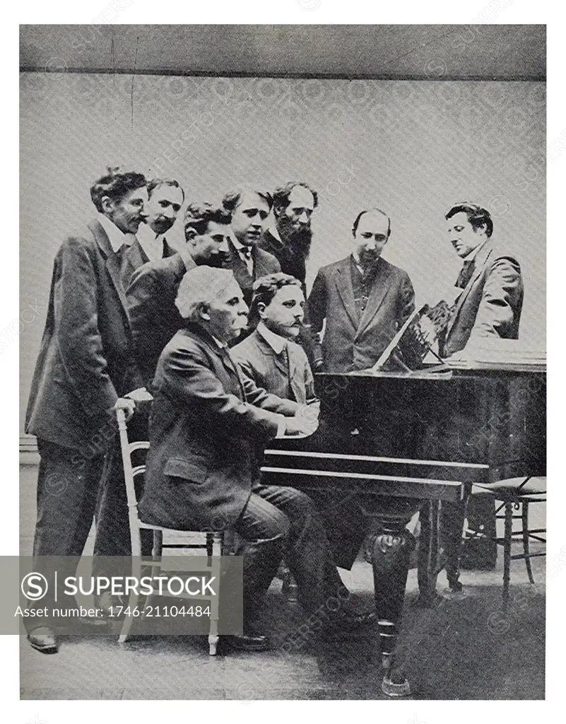 Founding committee of the Société musicale indépendente 1909. Gabriel Faure (1845-1924) and Jean Roger-Ducasse (1873-1954), French composers, at the piano, accompanied, behind them, by Louis Aubert, Maurice Ravel, A.Z. Mathot, Andre Caplet, Charles Koechlin, Emile Vuillermoz and Jean Hure, from left to right.