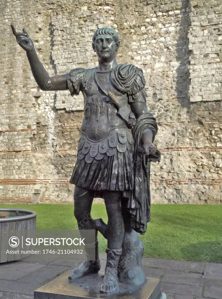 Bronze statue believed to be of the Roman Emperor Trajan. The statue is located in front of a section of the London Wall at Tower Hill. Created 1st Century A.D. Dated 2014