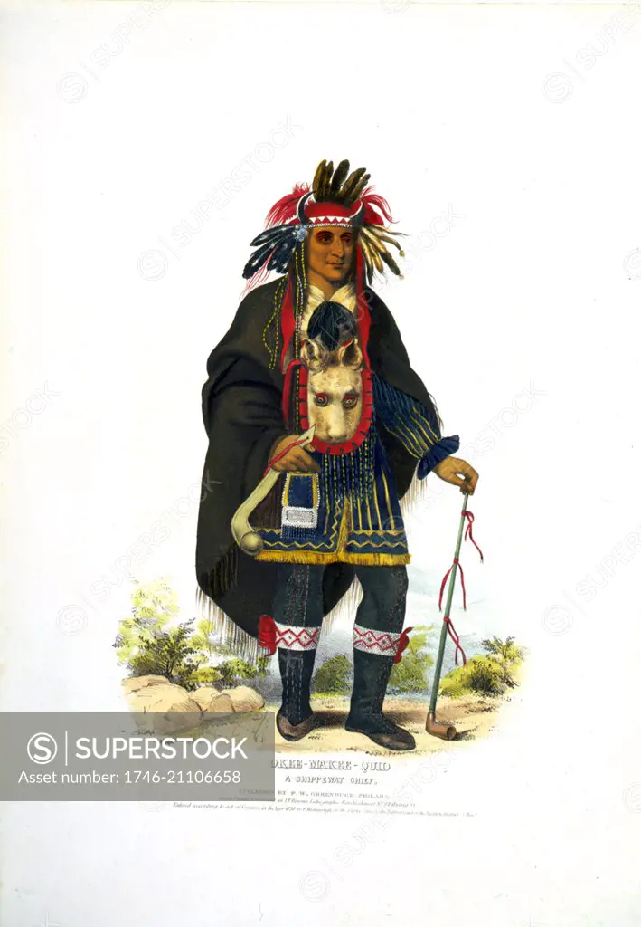 Okee-Makee-Quid a Chippewa chief wearing a buffalo headdress, holding a war club and a long peace pipe. The Ojibwe (or Chippewa) are one of the largest groups of Native Americans in North America.