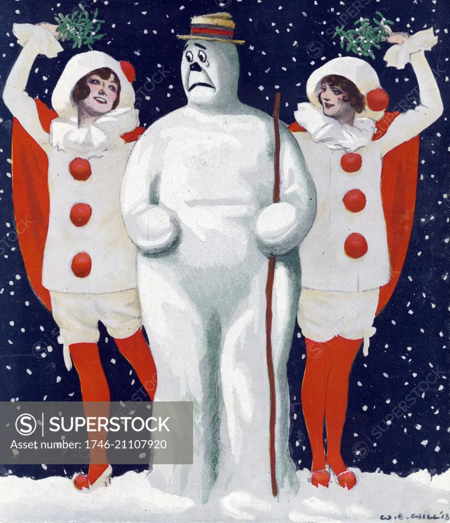 Christmas Puck by artist William Ely Hill (1887-1962). Illustration shows an anxious snowman standing between two beautiful young women wearing clown costumes and holding mistletoe over their heads during an evening snow shower. by Keppler & Schwarzmann in December, 1913.