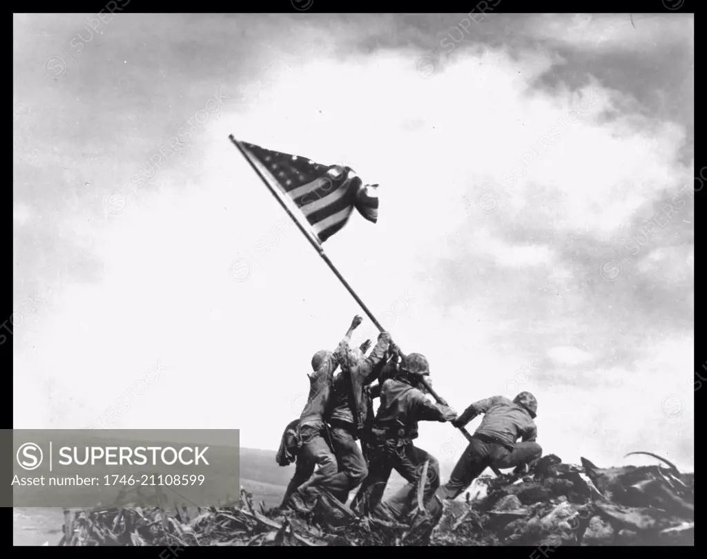 Flag raising on Iwo Jima. Left to right: Pvt 1st class Ira H. Hayes; Pvt 1st class Franklin Sousley, (KIA); Sgt Michael Stank, (KIA), Pharmacist Mate 2/c John H Bradley; Pvt 1st class Rene A. Gagnon and Cpl Harlon H Block, (KIA).