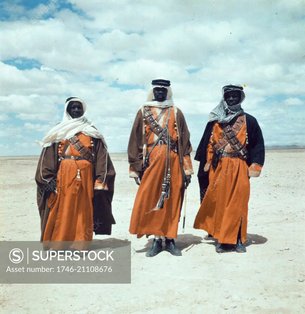 Three Bedouin men, standing, facing front, 1938.