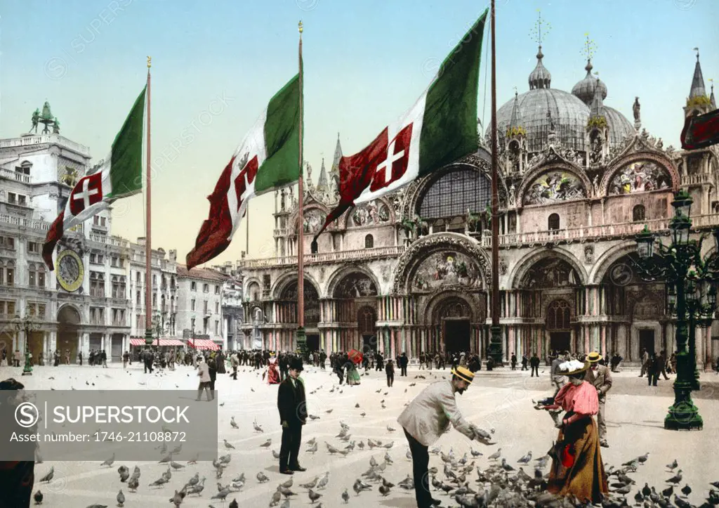 Feeding Pigeons in St Mark's square Venice, Italy 1900