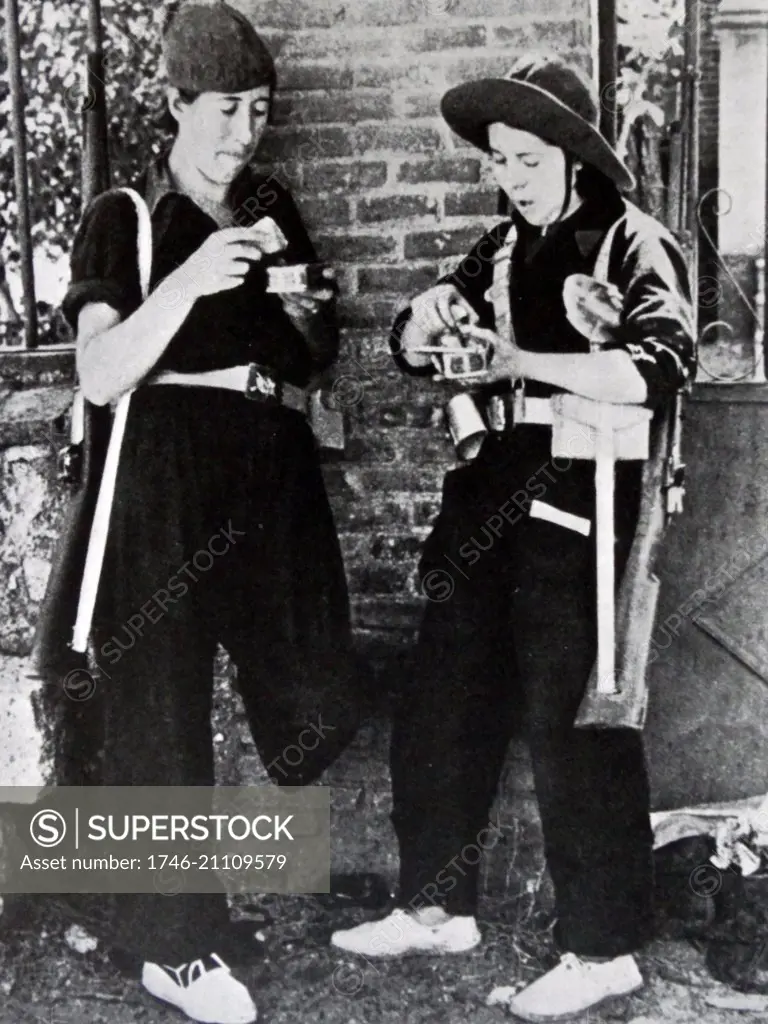 Spanish Civil War female Republican militia guards, at Guadarrama, eating