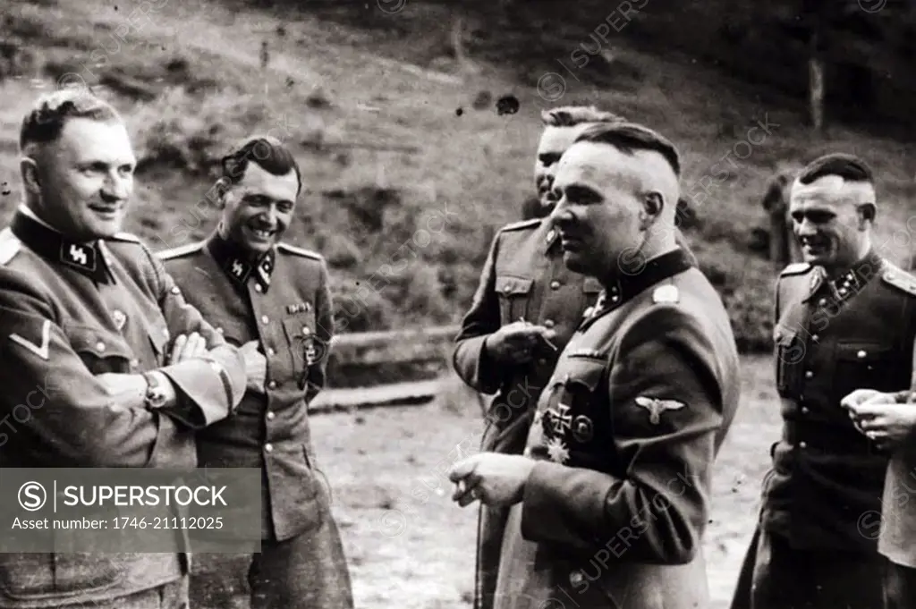 group of SS officers in Auschwitz: From left, Karl Hoecker, Dr. Josef Mengele, Karl-Friedrich Hoecker (11 December 1911 ñ 30 January 2000) was a SS-Obersturmf¸hrer (First Lieutenant) and the adjutant to Richard Baer, who was a commandant of Auschwitz concentration camp from May 1944 to December 1944