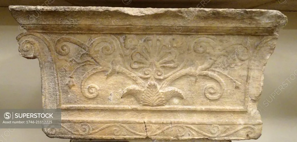 Finial of back of a Greek, 3rd century BC, marble bench (exedra) in the form of an Ionic pilaster-capital. An inscription on the return honours Apollonides