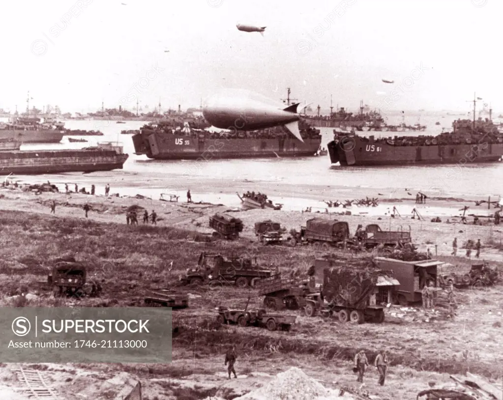 Photograph of D-Day landing vehicles, vessels used to convey a landing force (infantry and vehicles) from the sea to the shore during an amphibious assault. Dated 1944