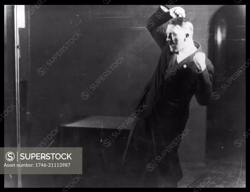 German Nazi leader Adolf Hitler, rehearsing a speech in front of the mirror 1933