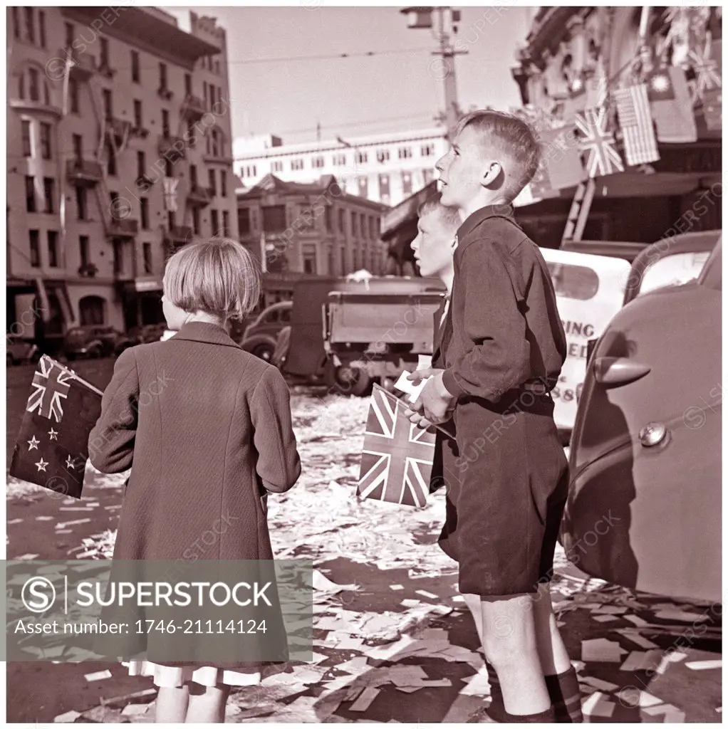 Photograph of children during VE day celebrations, Lambton Quay, Wellington. Dated 1945