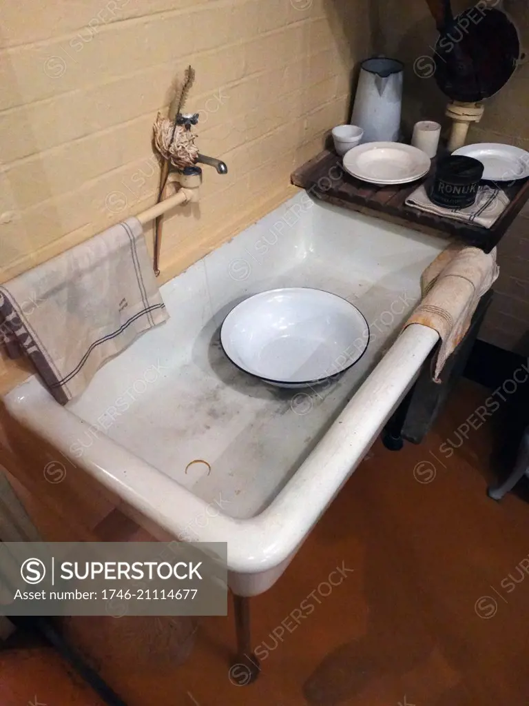 sink with tap in the Cabinet war rooms bunker, London; England. The War rooms were used by the British Government as protection for senior ministers during World war two.