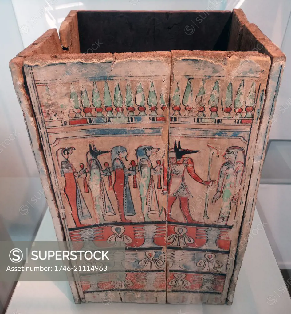 Wooden box used in an Egyptian tomb, as container for the internal organs during the Ptolemaic Period (302-30 BC). Richly decorated with religious motifs with several amulets between them. (wedjat-eyes,the dyed pillar, the Isis knot, the symbol of Ufe the ankh or the uas sceptre).