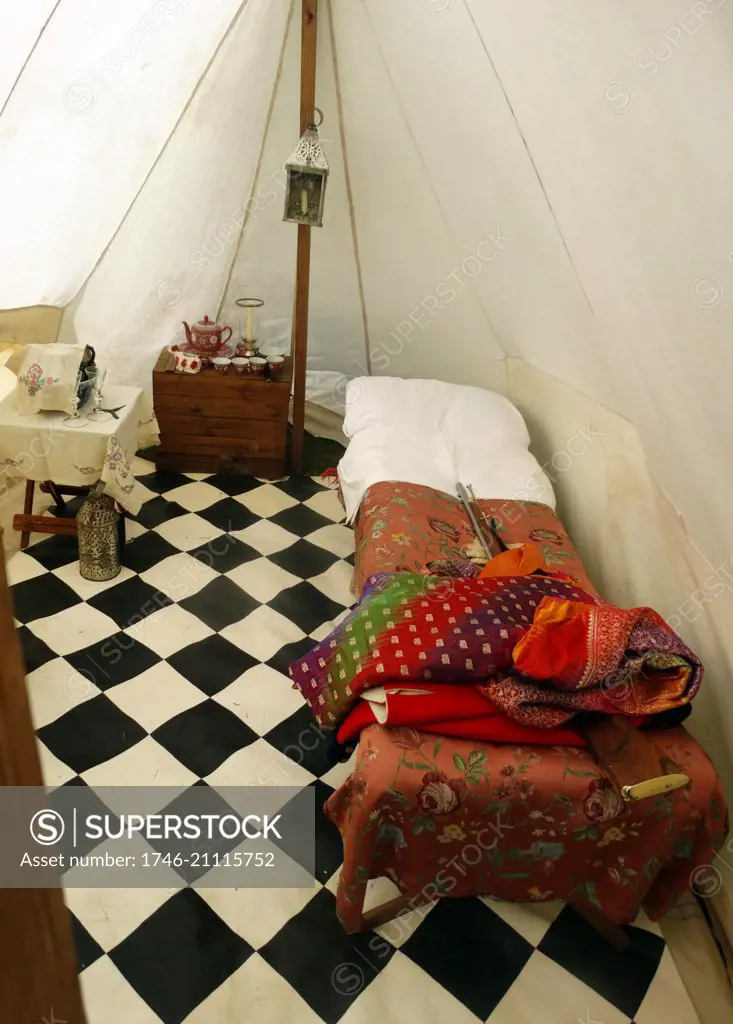 18th century British army officers tent with rolled tile flooring and bed (reconstruction)