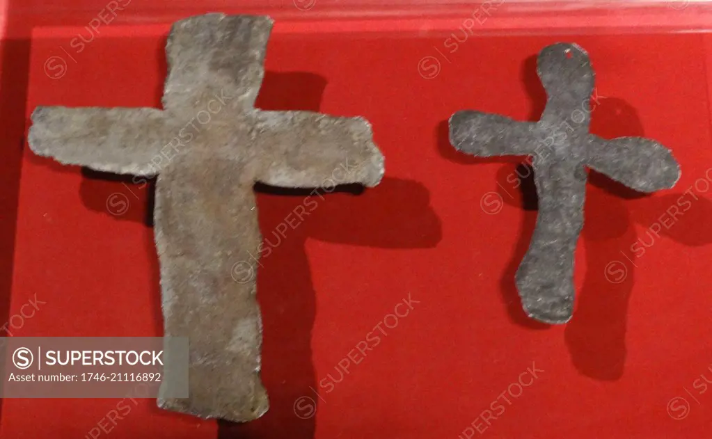 Lead crosses. Used specifically to mark and mourn death. English, 1348-1349.