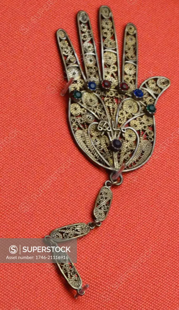 Amulet from a collection of Algerian, Italian and Tunisian amulets. Amulets such as this would have been kept in the home or worn on the body in order to provide protection against evil spirits or in order to help cure ill health.