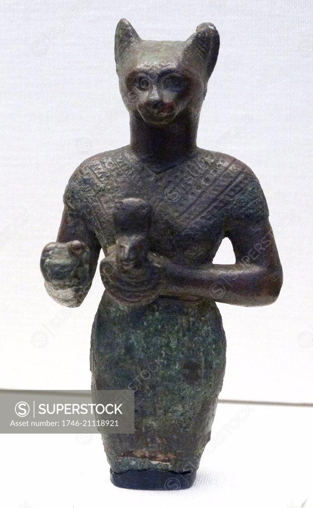 Upper Portion Of A Bronze Figure Of Bastet Holding A Cat Aegis. From ...