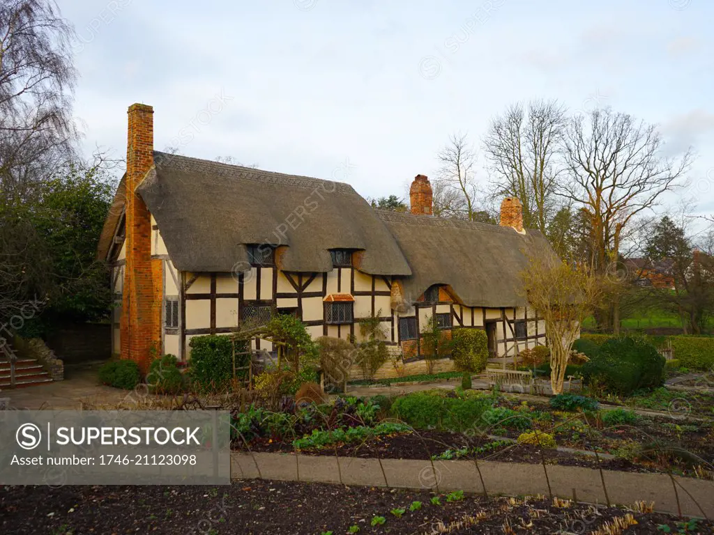 Anne Hathaway's Cottage, where Anne Hathaway, the wife of William Shakespeare, lived as a child. Stratford-upon-Avon, England. The earliest part of the house was built prior to the 15th century; the higher part is 17th century