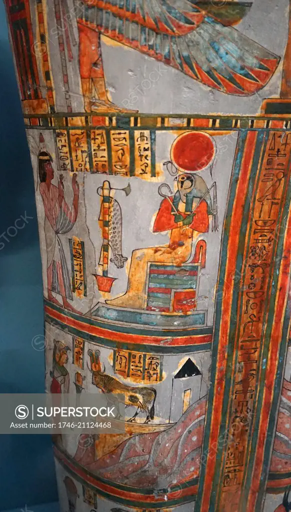 Coffin of Denytenamun, Priest of Amun. The Coffin depicts the sun-god on solar-barque protecting the breast with Osiris, flanked by Isis and Nephthys. Below, a vertical register of hieroglyphs runs down the centre of the body and is flanked by six vignettes: the cow of Hathor and the bull of Ptah-Sokar-Osiris standing before the western mountains and the tomb of the deceased, the four Sons of Horus, with jackals beneath, the foot section is damaged in places; the base - is decorated with represe