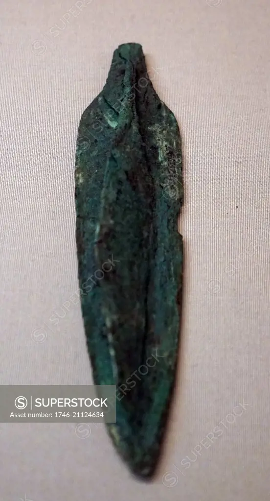 Copper alloy spear heads corroded together