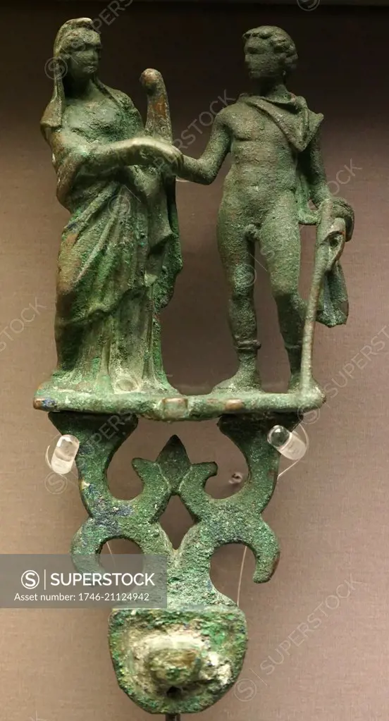 Bronze attachment showing either Hermes, leading a soul into the underworld, or Orpheus and Eurydike. Dated 200 BC