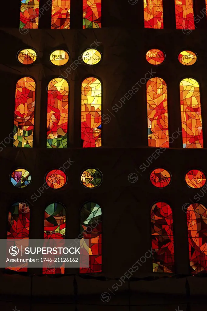 Stained glass window at the BasÌlica i Temple Expiatori de la Sagrada FamÌlia, a Roman Catholic church in Barcelona, designed by Spanish architect Antoni GaudÌ (1852ñ1926). Dated 21st Century