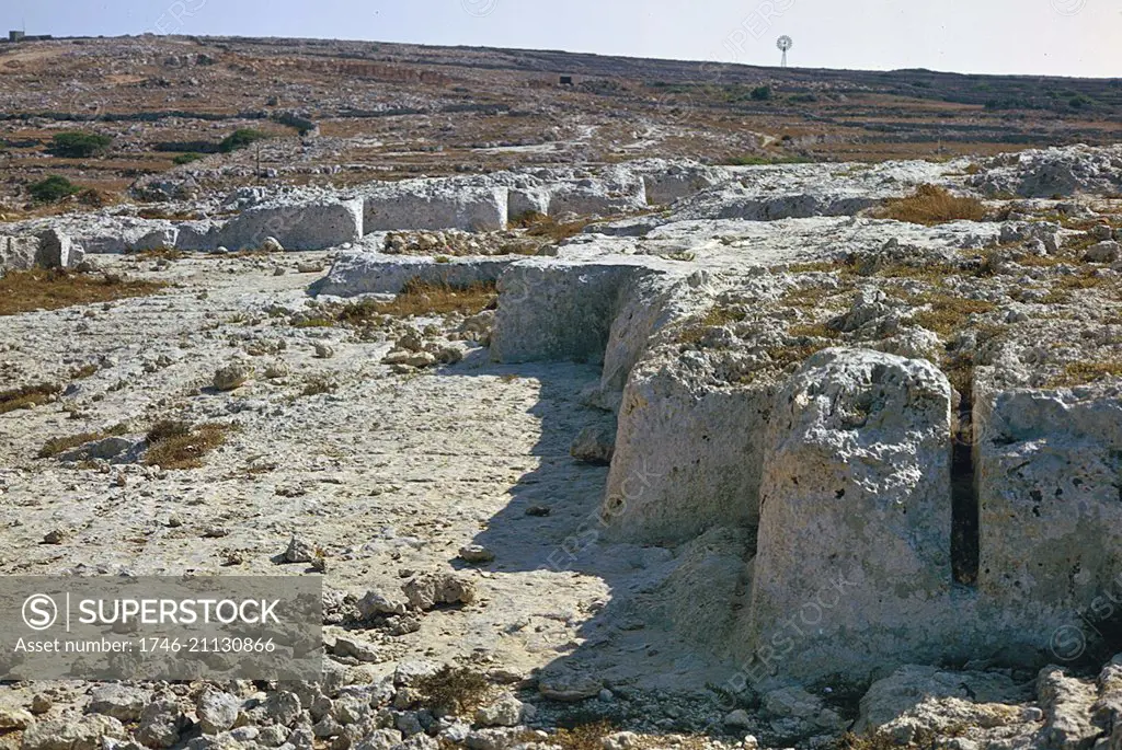 Site where megaliths were being cut from the rock surface in prehistoric times. Malta, 1973.