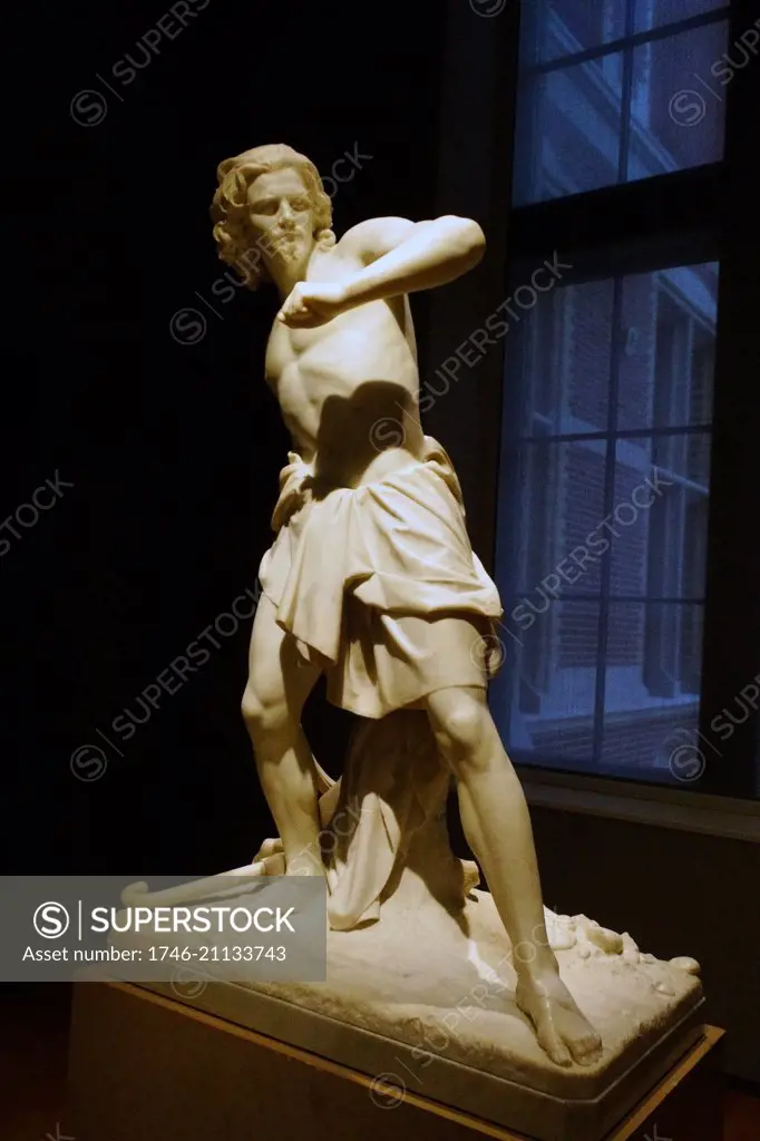 Marble figurine of David about to sling a stone at Goliath. By Pietro Magni (1817-1877). Dated 1851