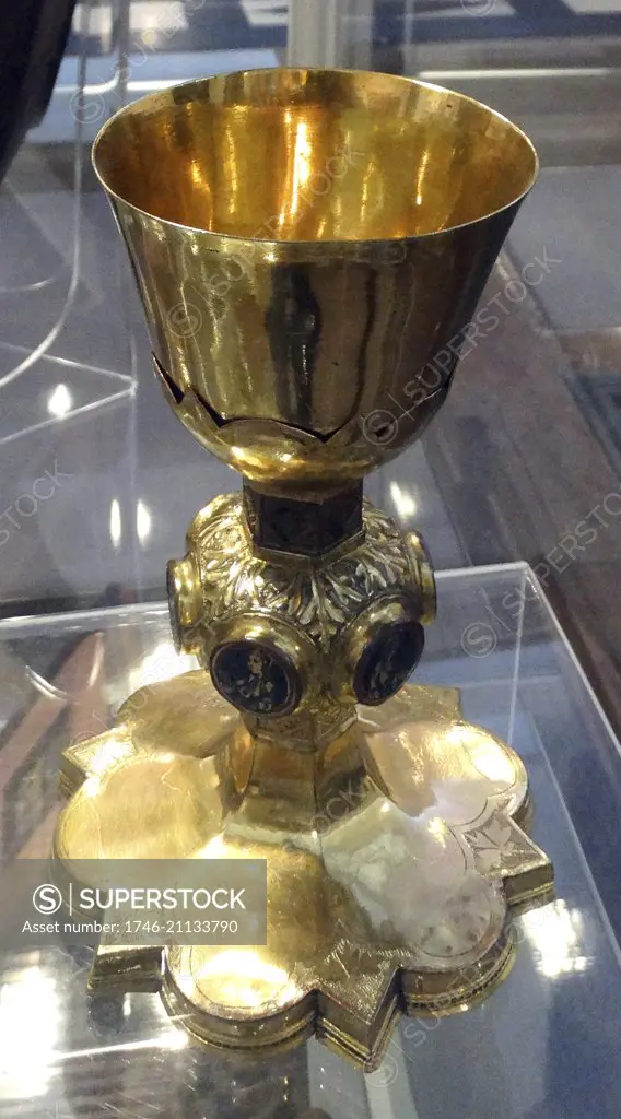 Chalice. Siena; Italy; 1325-75 made with copper and gold. A chalice is used during the Eucharist or Holy Communion; to hold wine. It is one of the most sacred vessels in Christian worship. This example is decorated with enamel medallions representing Christ on the cross and five saints.