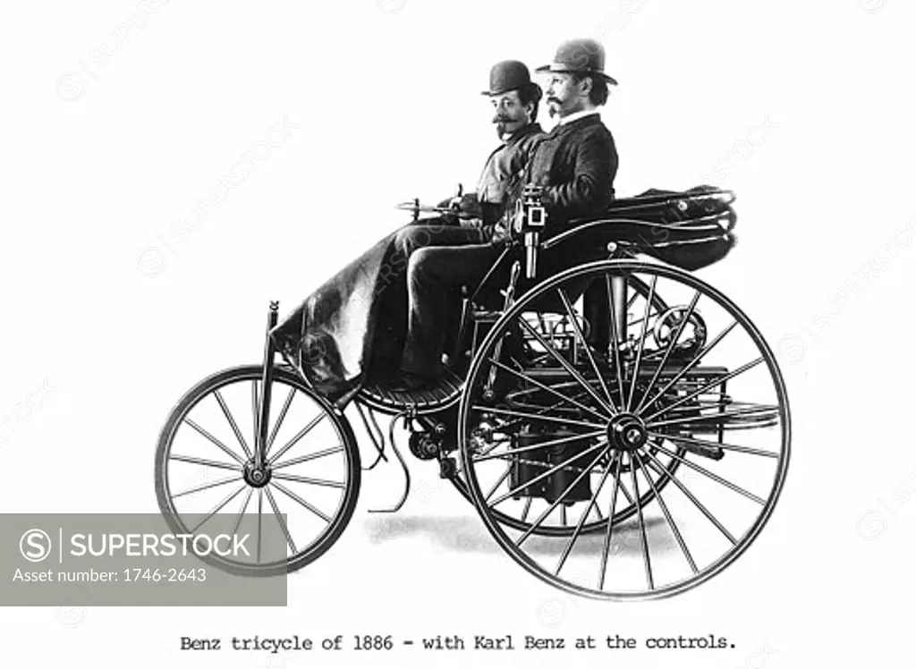 Benz tricycle of 1886 with Karl Benz (1844-1929), German engineer and car manufacturer, at the controls