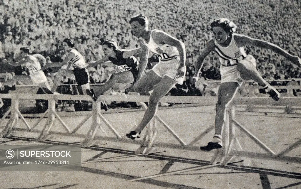 Photograph of Mildred Ella "Babe" Didrikson Zaharias (1911 - 1956) winning the 80m Hurdles at the 1932 Olympic games. Babe gained world fame in track and field and All-American status in basketball.