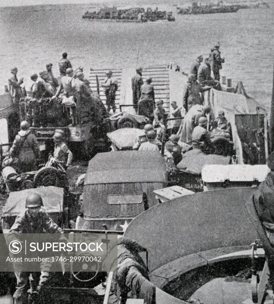 Black and white photograph of World War II (1939-1945) showing images from the Allied sea invasion of Normandy on D-Day, 6 June 1944; American reinforcements arrive.