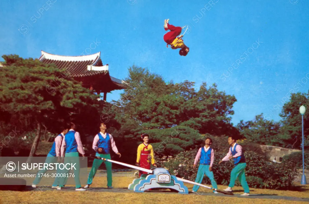 Ethnographic game "Jumping on the board" (from circus performances). North Korea 1986