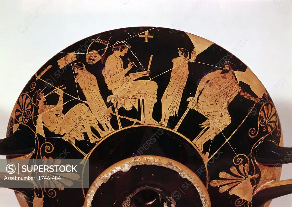 Masters and pupils at the Athenian school where studies included music. Greek red figure vessel . Staatliche Museum Berlin