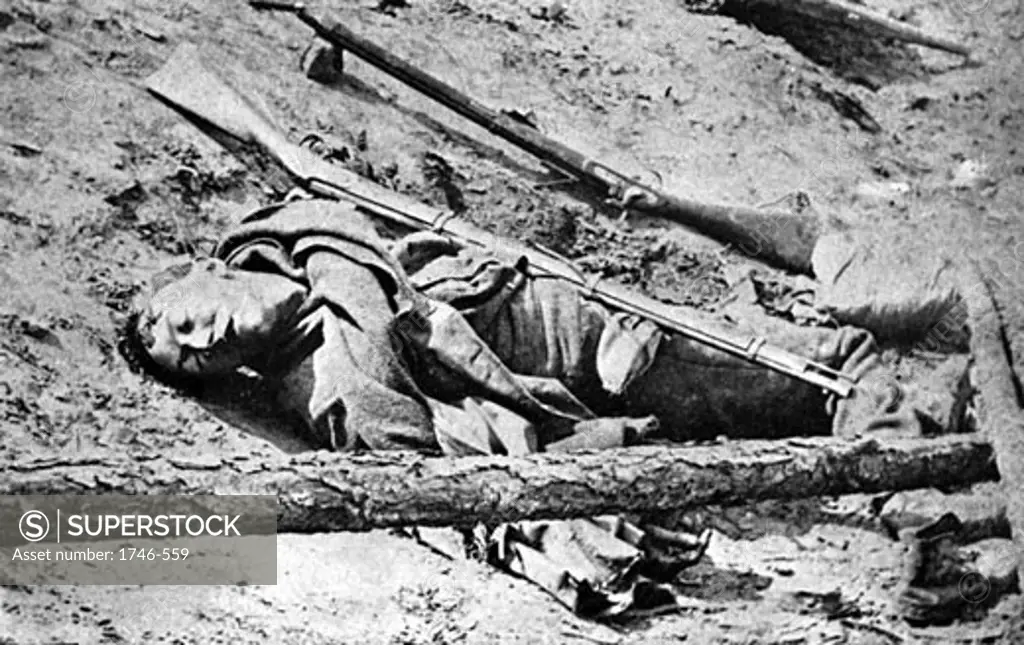 Dead Confederate soldier lying in a trench, Petersburg, Virginia, Photographed April 3, 1865, American Civil War, (1861-1865)