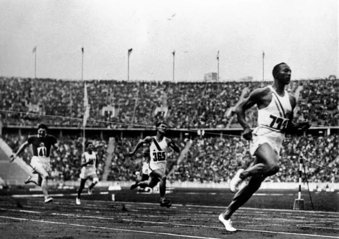 Jesse Owens running at the 1936 Olympics in Berlin.