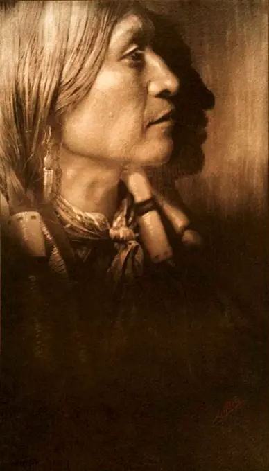 Native American Indian: A Jicarilla chief, c1904. Photograph by Edward Curtis (1868-1952).