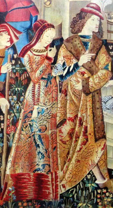 Tapestry of a richly dressed couple made in France. Dated 15th Century