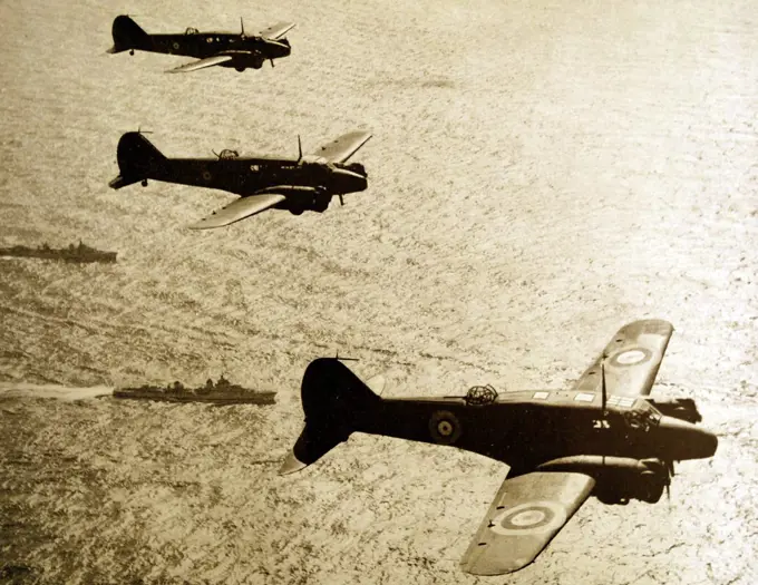 Photograph of the flight of Arvo 'Ansons' of a general reconnaissance squadron. The squadron is working in conjunction with a destroyer patrol. Dated 1939