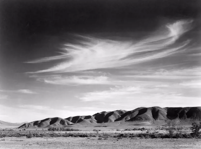 Photograph of a view from Manzanar to the Alabama Hills. Photographed by Ansel Adams (1902-1984) photographer. Dated 1943