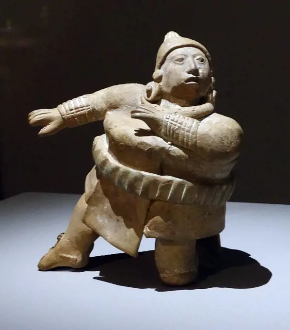 Mayan ceramic figure playing with a ball, From Jaina, Campeche, Mexico 600-900AD