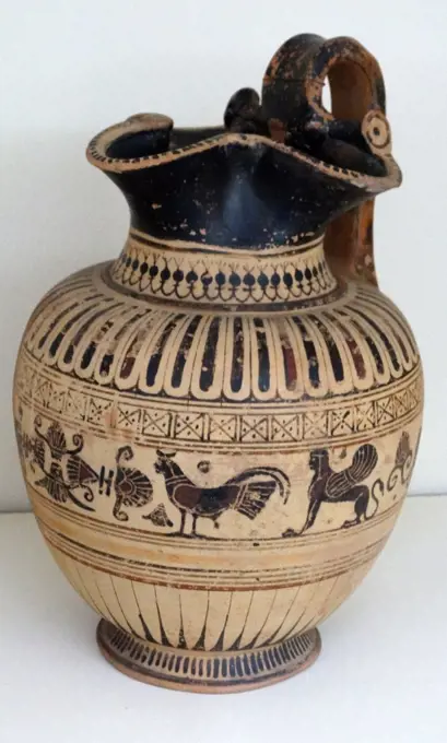 Wine-jug decorated with a siren and sphinx. Laconia, Greece. Dated 550 BC