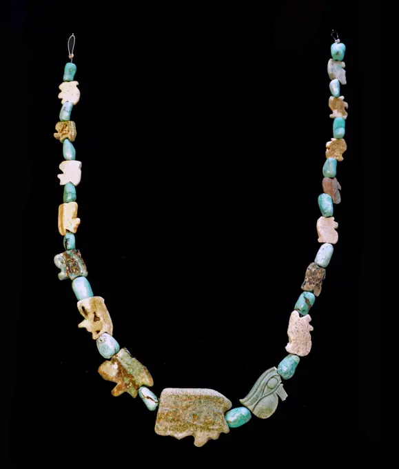 Egyptian Necklace with faience Wadjet-amulets and turquoise beads. Ptolemaic Period (302-30 BC). Lapis lazuli represented the night)sky; the hair of the gods was made of lapis lazuli