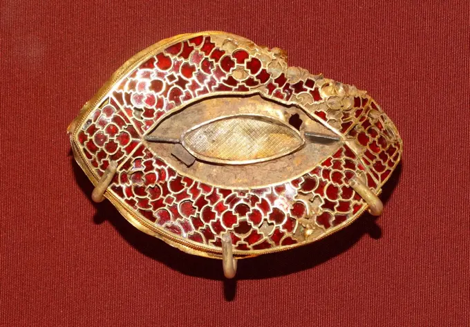 Artefact from the Staffordshire Hoard of Anglo-Saxon gold and silver metalwork. Discovered in a field near the village of Hammerwich, near Lichfield, in Staffordshire, England, on 5 July 2009, it consists of over 3,500 items from the Anglo-Saxon kingdom of Mercia.