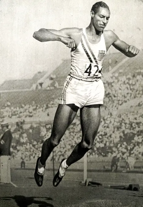 Photograph of Edward Lansing "Ed" Gordon, Jr. (1908 - 1971) competing in the long jump during the 1932 Olympic games. Edward won Gold jumping 7.64 meters. 