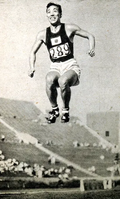 Photograph of Chuhei Nambu from Japan competing in the Long Jump during the 1932 Olympic games. He finished third in the Long jump that year, however he made a new world record in the Triple Jump, jumping 15.72 meters. 