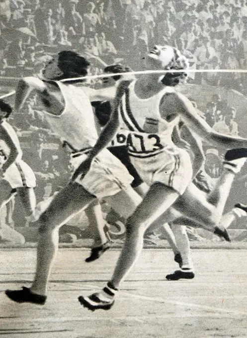 Photograph of Mildred Ella "Babe" Didrikson Zaharias (1911 - 1956) winning the 80m Hurdles at the 1932 Olympic games. Babe gained world fame in track and field and All-American status in basketball.