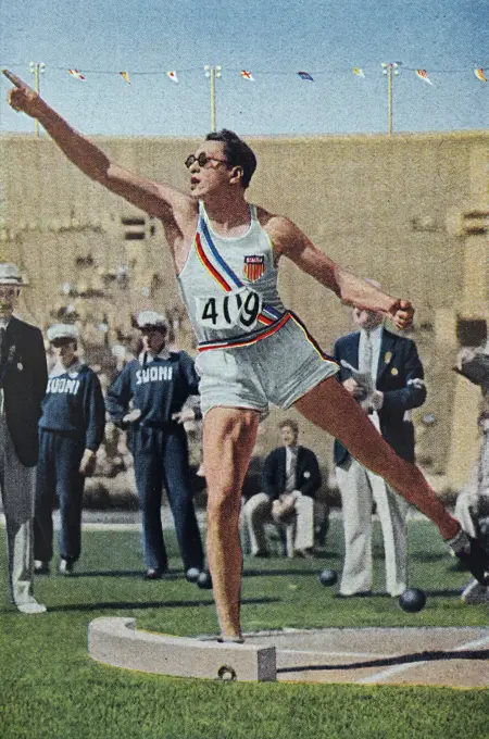 Photograph of Wilson David "Buster" Charles, Jr. (1908 - 2006) shot putting in the Decathlon during the 1932 Olympic games. 