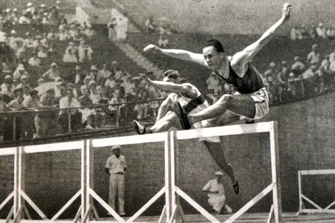 Photograph of Akilles "Aki" Eero Johannes Järvinen (1905 - 1943) jumping Hurdles during the 1932 Olympic games. Aki served as the Finnish flag bearer. 