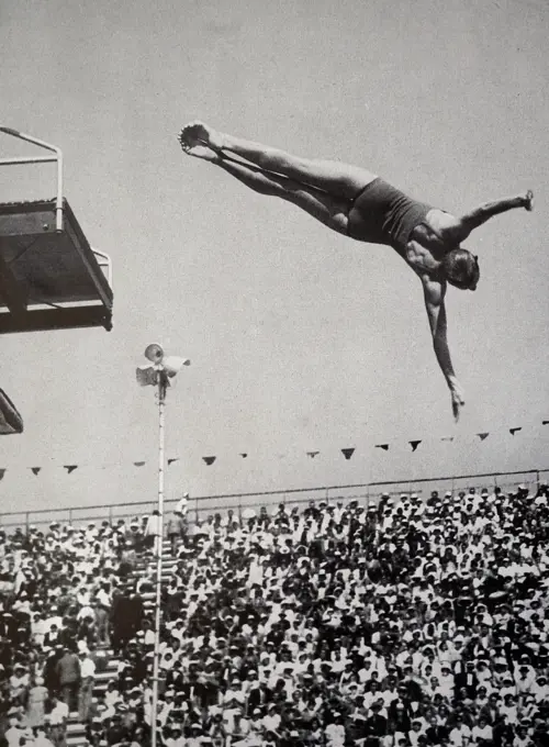 Photograph of Katherine Louise Rawls (1917 - 1982) in the springboard diving event at the 1932 Olympic games. 