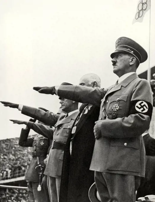 German Fuhrer Adolf Hitler takes the salute at the Berlin Olympic Games in 1936